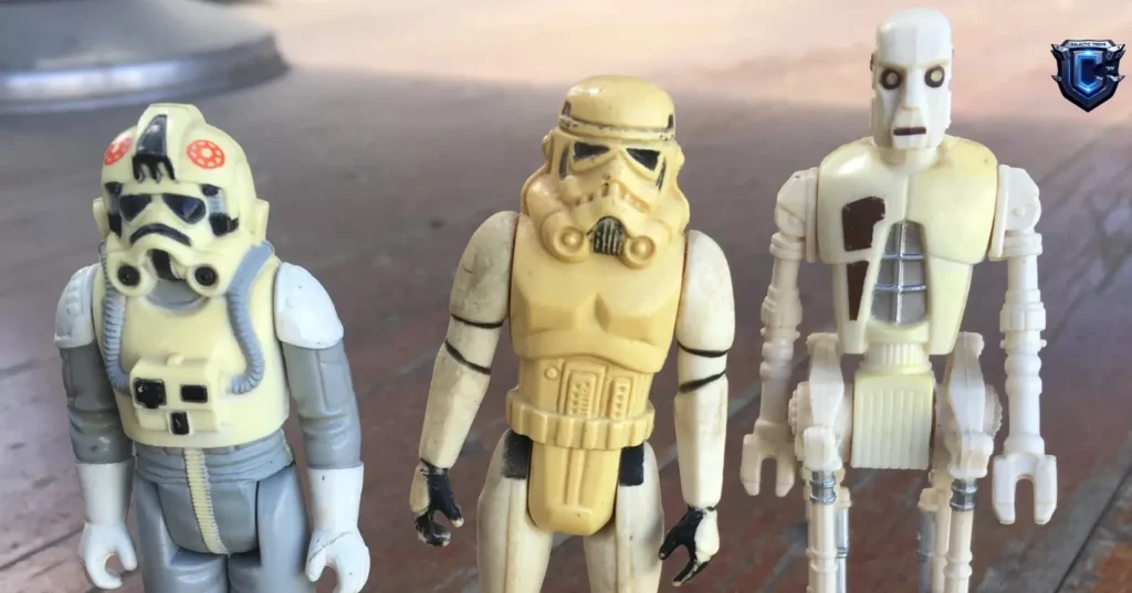 yellowed PVC figure vs new